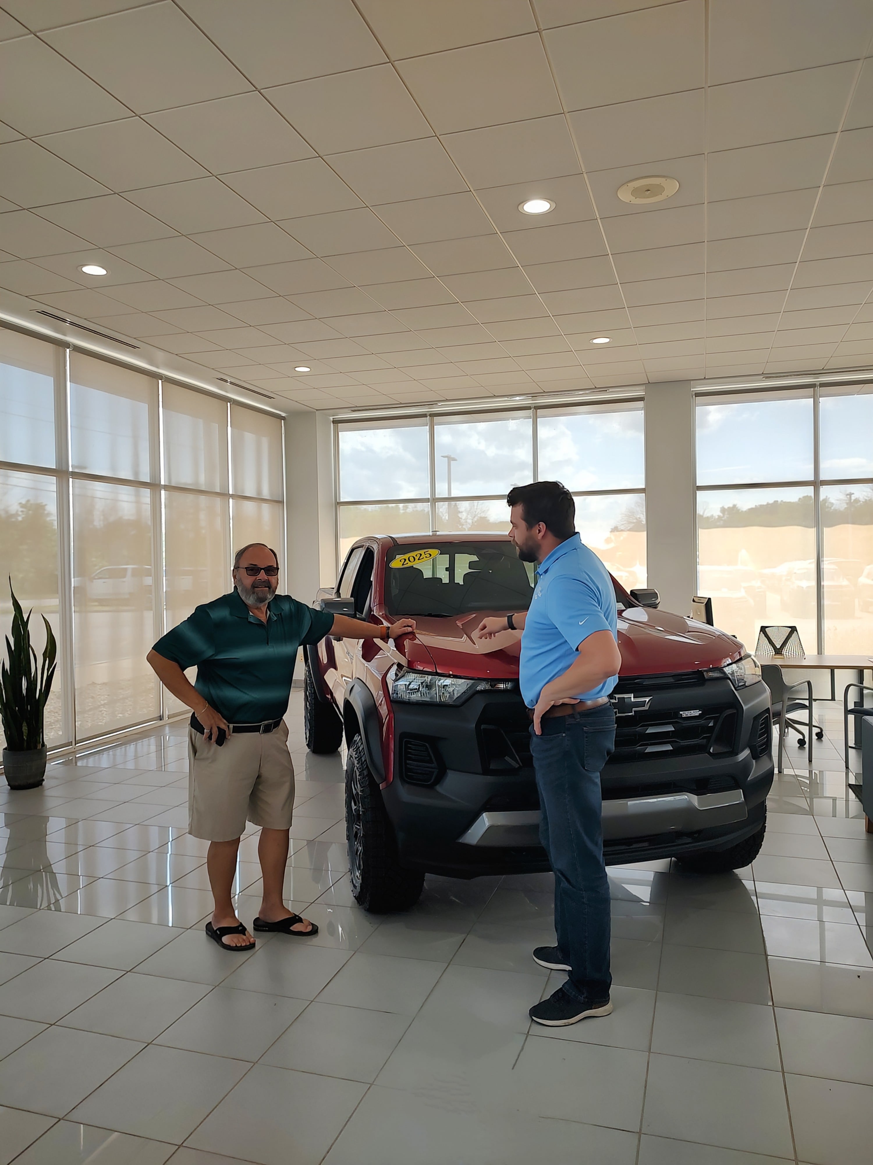 Sales associate talking to customers